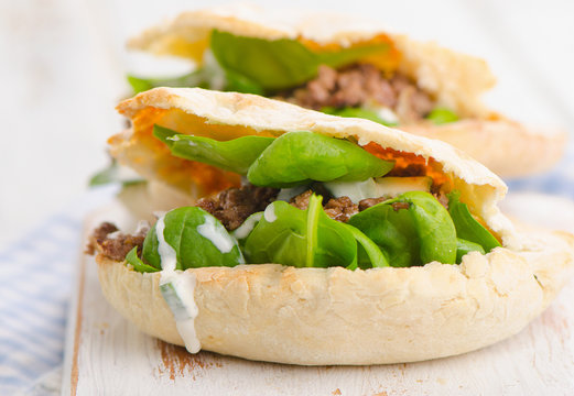 Pita bread with meat and vegetables.