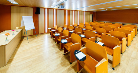 orange interior conference halls with flipchart