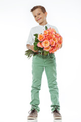 stylish boy with roses bouquet 