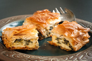 Home made spinach and feta pie. A popular Greek Cypriot dish made with layered filo pastry.