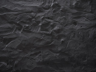 Dramatic dark grey concrete wall background. Raw concrete wall texture, customizable, suitable for background use.