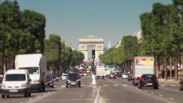 Slow Motion Traffic Avenue Champs Elysee, Paris - 1080p. Slow Motion of the Avenue des Champs-Élysées. Famous Arc de Triomphe de l'Étoile in Paris, France