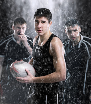 Rugby players in the rain