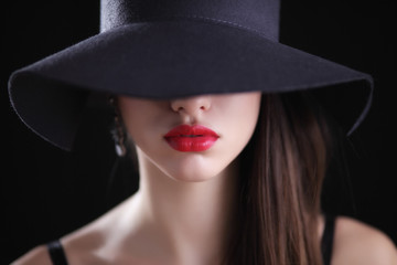 Fototapeta na wymiar Young woman in hat