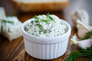 snack salty cheese with herbs