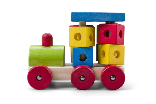 Wooden car - truck toy with colorful blocks isolated over white