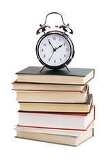 Alarm clock with a stack of books