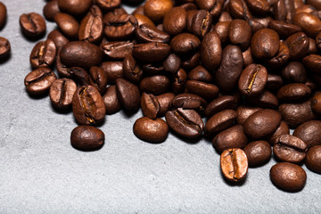 Coffee beans on the slate background