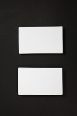 Fototapeta premium blank business cards stack up on Black background