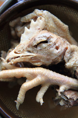 chicken head and leg as food
