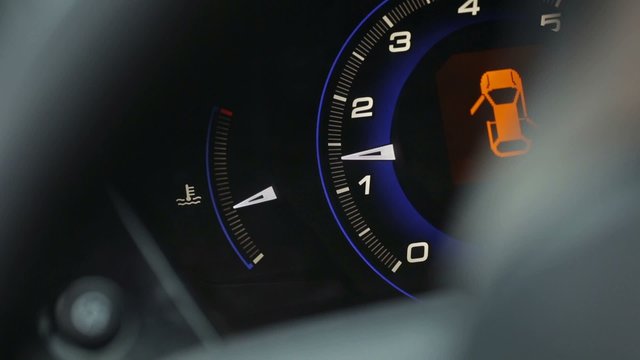 Malfunction or check engine car symbols, dash board close up