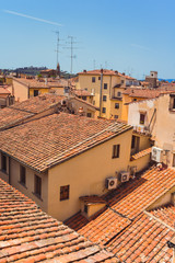 many houses with tiled roofs