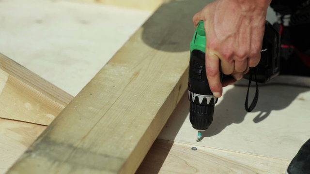 carpenter works screwdrivers