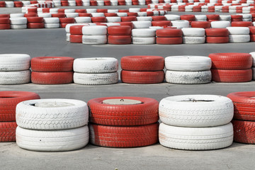 red and white racing track tires on a race track