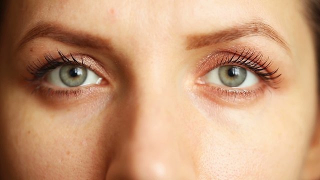 Woman's green eye close up