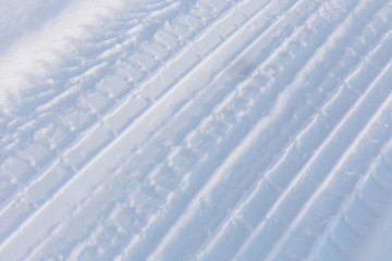 Tire tracks on the snow, winter scene