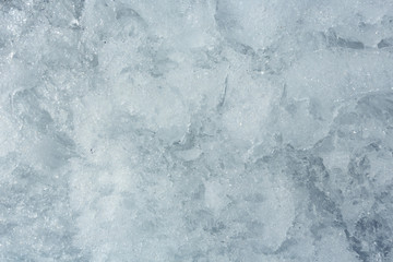 Naklejka na ściany i meble Glacial block of ice closeup.