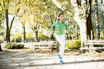 Young woman running in the park