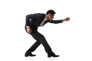 business man posing tug of war