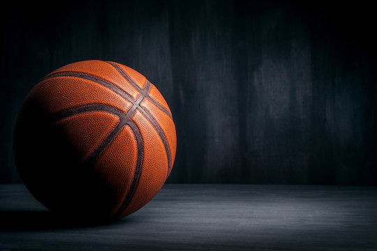 basketball ball on a black background © BortN66