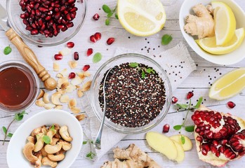 Quinoa salad and honey-lemon dressing ingredients .Healthy eating. Superfoods concept.
