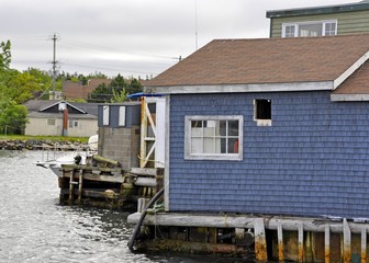 Fototapeta na wymiar Fisherman's Cove, active fishing village on the shore of the Atlantic Ocean in Eastern Passage, near Halifax Nova Scotia