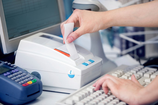 POS Terminal Transaction. Hand Swiping a Credit Card.