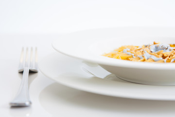 gold and silver sauce pasta