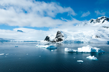 Mountains and ices of Antarctica in a beautiful sunny day