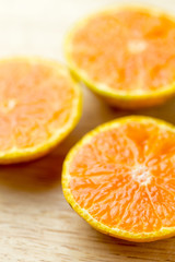 Slice fresh orange fruit  on wood background