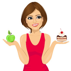 attractive woman choosing between green apple or sweet piece of cake