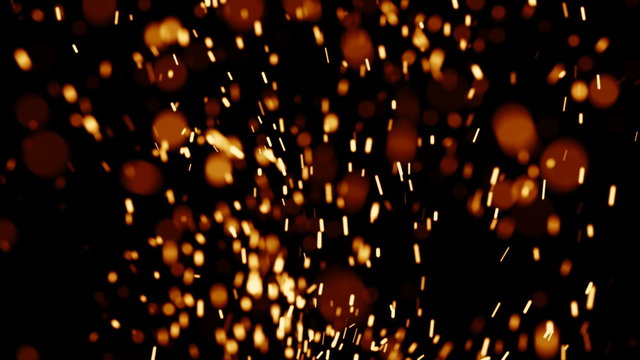 Rising Embers, High Flames (24fps). Fire on high heat, hot burning embers rise up. The shallow focus makes the particles bokeh.
