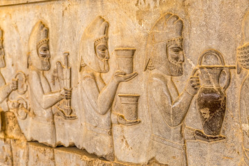 Armenian tribute relief detail on the stairway facade of the Apadana at the old city Persepolis.