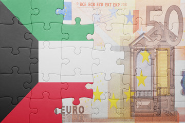 puzzle with the national flag of kuwait and euro banknote