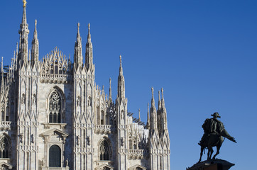 milan a glimpse of the beautiful cathedral city with a statue in