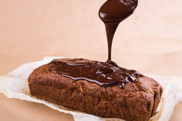 Homemade banana bread with chocolate on the baking paper