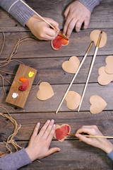Painting hearts for Valentine’s Day 