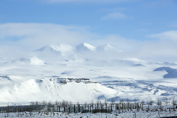 Fototapeta na wymiar Snowy mountain landscape, Iceland
