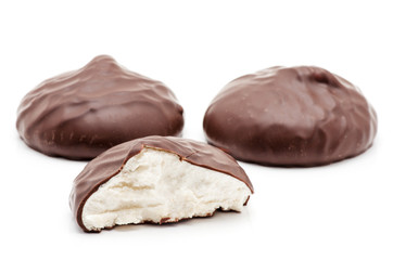 chocolate covered marshmallows on white background