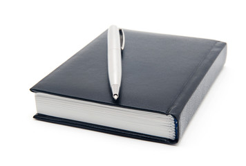 black diary and pen on a white background