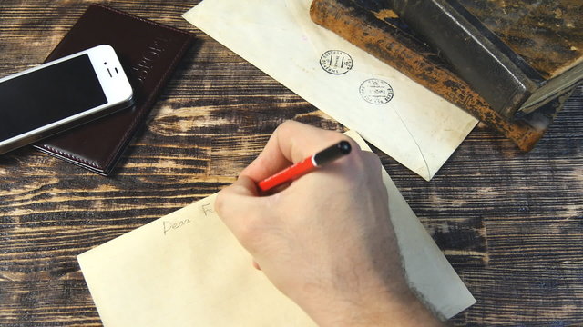 Man hand write letter on vintage background