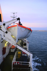 The image of life-boats on a ship
