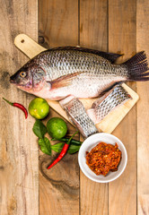 Fresh raw fish on the wood