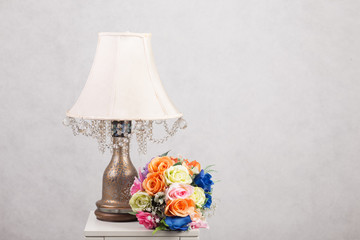 Flower with Lamp on table