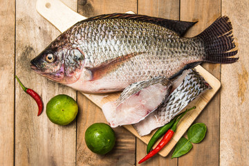 Fresh raw fish on the wood