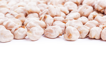 Raw dry chickpeas on white background
