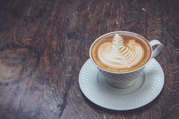 Cup of latte Coffee on wood table