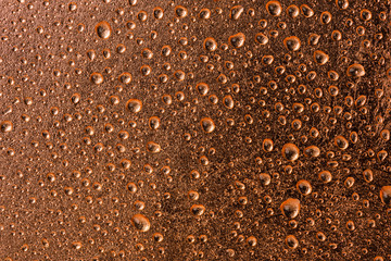 Fresh Water Drops dew on copper alloy texture surface showing fr