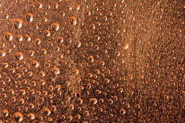 Fresh Water Drops dew on copper alloy texture surface showing fr