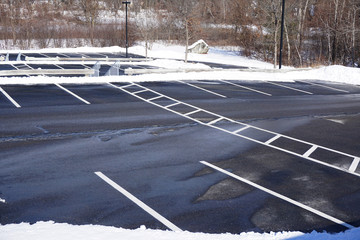 empty parking lot with snow removed
